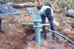 Nearly-completed well, already pumping out water